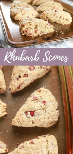 some scones are on a baking sheet and one has been cut in half to show the filling