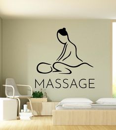 a wall decal with the words massage on it and a woman's silhouette