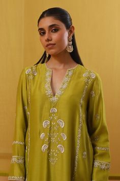 Lime green full sleeves A-line kurta with Bahar silk thread embroidery, highlighted with zari and sequins. Paired with a pant and an embroidered dupatta. - Aza Fashions Green Long Sleeve Dress For Diwali, Festive Green Long Sleeve Sets, Green Anarkali Kurta With Long Sleeves, Long Sleeve Tops With Dabka Work For Wedding, Long Sleeve Blouse With Dupatta For Eid, Festive Long Sleeve Blouse With Dabka Work, Green Long Sleeve Kurta For Transitional Season, Festive Long Sleeve Tunic With Zari Work, Long Sleeve Tunic For Festivals