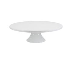 a white cake plate sitting on top of a table