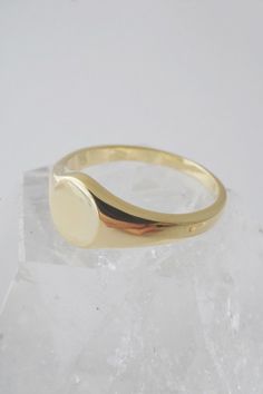 A miniature, sweet signet ring in a slim band with a flat, blank top. Our materials make for an amazing, high quality, seamless, jewelry piece with longevity. Our rings are plated with 24k gold, 18k rose gold, or sterling silver and finished with a protective coating. A little secret we'll keep between us: it looks way more than it costs. Coconut Wax Candles, Silver Signet Ring, Gold Signet Ring, Womens Watches Luxury, Between Us, Shoes With Jeans, Signet Ring, High Quality Jewelry, 18k Rose Gold