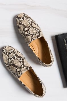 Add an element to the otherwise boring formal look with this Snakeskin printed slip-on is for a fun feminine work look. You can get it over semi-casual basics and blazers or just plain dresses to make it just the right look. Casual Slip-ons For Office In Spring, Casual Office Slip-ons For Spring, Chic Business Slip-ons For Spring, Casual Slip-ons For Business Casual, Chic Slip-ons For Workwear, Chic Spring Workwear Slip-ons, Plain Dresses, Dresses To Make, Casual Basics