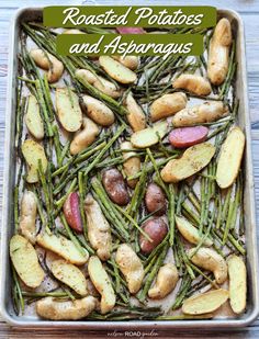 roasted potatoes and asparagus in a baking pan with text overlay that reads roasted potatoes and asparagus