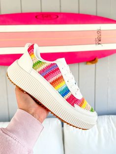 Expertly designed for fun and style, these Court Rainbow Platform Sneakers will elevate your outfit! The crisp white platform provides a boost of height while the vibrant rainbow stripes on the side add a playful touch.  These fit true to size!