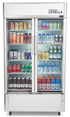 an open refrigerator with drinks and sodas on the doors that are both glass doored