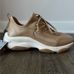 Very Soft. Gentle Taupe/Beige Color. They Are Too Big For Me. :( Size Eu 37 Size Us 6.5 Chic Sneakers With Cushioned Footbed And Round Toe, Chic Beige Sneakers With Round Toe, Chic Beige Sneakers For Spring, Chic Lace-up Synthetic Sneakers, Chic Round Toe Sneakers In Synthetic, Chic Sneakers With Synthetic Material And Round Toe, Chic Synthetic Sneakers With Round Toe, Chic Synthetic Sneakers, Chic Sneakers With Removable Insole And Round Toe