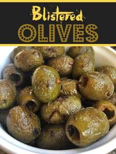 an image of stuffed olives in a bowl with text overlay that reads, blistered olives