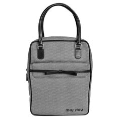 Resurrection Vintage is excited to offer a vintage Miu Miu black and white bowling bag style handbag that features a geometric print, black leather trim and bow, front pocket with flap, and chrome hardware. Miu Miu Size Medium Woven Fabric, Leather Strap Drop 5" Bag Length 8" X Width 3" X Height 10.5" Excellent Vintage Condition Wear Consistent With Age Circa 1990s Authenticity Guaranteed Vintage Miu Miu, Bowling Bag, Bowling Bags, Black And White Abstract, Bag Style, Black Pattern, Fashion Handbags, Bowling, Geometric Print