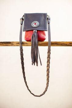 "Tiny but mighty.  Hand made red and brown leather bag.  Braided rein strap with vintage slotted concho and fringe detail on flap over.   Conchos at srape ends as well. 5\" w x 8\" h x 1 1/2\" deep natural leather interior I find all the leather and findings and make the bags one at a time at my studio in San Diego." Leather Bags With Concho For Everyday Use, Bohemian Leather Bag With Concho, Navajo Textiles, Textile Bag, Red And Brown, Brown Leather Bag, Vintage Navajo, Bag Vintage, Vintage Textiles