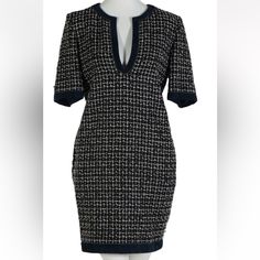 A Classic Chanel Paris French Designer Ladies Short Sleeve Tweed Sheath Dress. Features Blue Suede Leather Trim, With A V Neck Design, Lime Green, Blue And White Tweed, Accented With A Single Enameled Button At One Side Of The Dress. Made Of Wool, Silk And Lambskin. Retains Original Labels And A $3900 Price. Elegant Tweed V-neck Dress, Fitted Tweed V-neck Mini Dress, Elegant V-neck Tweed Mini Dress, Elegant Blue Tweed Dress, Fitted Tweed V-neck Dress, Fitted V-neck Tweed Dress For Formal Occasions, Elegant Blue Tweed Dress For Formal Occasions, Chanel Sweater Dress, Vintage Chanel Dress