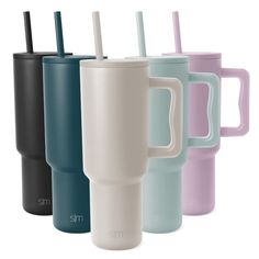 thermos travel mugs are lined up in different colors and sizes, with straws sticking out of them