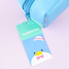 This kawaii pen case has a die-cut Tuxedosam design! Use it to organize your pens, pencils, and other things! Features a zipper closure Playful Pencil Case With Pen Slots For School, Playful School Pencil Case With Pen Slots, Playful School Stationery With Pen Slots, Kawaii Pen Holders For Back To School, Cute Stationery For Back To School Storage, Playful Pencil Case With Pen Slots For Gift, Kawaii Pencil Case With Pen Slots As Gift, Cute Stationery With Rectangular Case And Pen Slots, Cute Stationery With Pen Slots For Personal Use