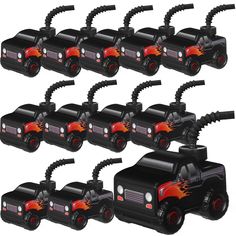 many toy cars are lined up together on a white background with red and black flames