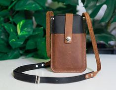 "All Leather Phone Bags & Shoulder Bag → https://www.etsy.com/shop/FashionRacing?ref=seller-platform-mcnav&section_id=23039609 Leather Phone Bag | Handcrafted | Leather Smartphone Pouch | Cross-body Phone Bag | Leather Phone Holder | CrossBody Bag | Mini Shoulder Bag Quality is important to us, which is why our leather phone bags are hand-crafted with the high quality leather. We understand that each customer is unique, so we offer free personalization on every crossbody phone bag. It's minimali Leather Mobile Phone Pouch For On-the-go, Brown Mobile Phone Bag Pouch For Travel, Brown Mobile Phone Pouch For Travel, Travel Pouch For Mobile Phone In Brown, Brown Travel Pouch For Mobile Phone, Brown Crossbody Mobile Phone Bag, Travel Brown Mobile Phone Pouch, Brown Pouch For Mobile Phone Everyday Use, Brown Rectangular Belt Bag For Gift