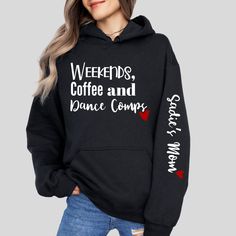 a woman wearing a black hoodie that says weekend's coffee and dance company