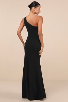 Leave the crowds speechless at the sight of you in the Lulus Mesmerizing Energy Black Cutout One-Shoulder Mermaid Maxi Dress! This exquisite dress has a stretchy crepe knit fabrication that shapes a one-shoulder neckline with a sexy cutout strap that flows into a darted bodice with an asymmetrical mesh insert at the center. The figure-skimming silhouette features asymmetrical seaming as it continues into a flattering mermaid skirt with an elegant maxi hem. Fit: This garment fits true to size. Le Fitted One Shoulder Mermaid Dress For Gala, One-shoulder Fitted Mermaid Dress For Gala, Fitted One-shoulder Mermaid Dress For Gala, One-shoulder Elastane Evening Dress, Fitted One Shoulder Maxi Dress With Sweep Train, Elastane One Shoulder Dress For Parties, One Shoulder Bodycon Dress For Gala, Elegant One Shoulder Elastane Evening Dress, Elegant One Shoulder Elastane Dress For Evening