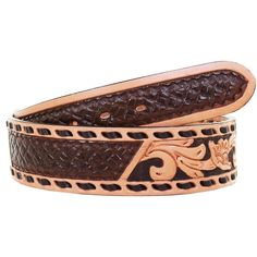 a brown belt with an intricate design on it