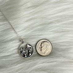 Calling all cottage witches - this beautiful sterling silver mushroom necklace makes the perfect accessory to add to your collection. A sterling silver mushroom charm pendant featuring an adorable little snail in the design comes on a sterling silver cable chain necklace. Choose between a 16", 18" or 20" length chain. Sterling silver mushroom necklace Comes in a jewelry box tied with ribbon; free gift wrap available Care card included on how to maintain the quality of your sterling silver jewelr Witch Mushroom, Snail Necklace, Necklace Pendent, Cottage Witch, Mushroom Necklace, Mushroom Jewelry, Soft Spot, Pendent Necklace, Red Vintage