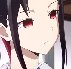 an anime character with red eyes and long black hair