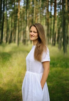 "White linen dress is simple, easy to wear and elegant. This handmade romantic, yet simple linen dress is perfect for everyday, special occasion, birthday or wedding at the beach. Minimalist, simple, short sleeved, loose fit dress with elastic waist band and side seam pockets is made from a washed linen fabric. In the second picture you can find size table and choose your size, if you are not sure which size to choose, or can't find your size, please contact me for details or advice. I have 15 y White Linen Dress For Day Out, White Summer Linen Dress, White Linen Sundress, White Linen Summer Dress, White Linen Dress Summer, Linen Dress Casual, Simple Linen Dress, Wedding At The Beach, Beach Minimalist