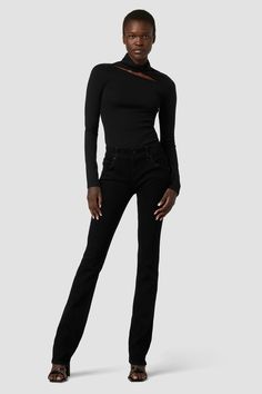 Description Cut with high stretch denim with a holds-you-in fit, our Beth Mid-Rise Baby Bootcut Jean in Black features a subtly flared silhouette, a clean hem and our signature button-flap back pockets. Product Details Front Rise: 8.5", Leg Opening: 16", Inseam: 34.5"Model Height 5'9"Model wearing size 25Measurements based on size 27 Fit & Care Content: 80% Cotton, 18% Lyocell, 2% ElastaneMachine wash cold with like colorsDo not bleachTumble dry low or hang to dry Fitted Black Elegant Flare Jeans, Elegant Black Fitted Flare Jeans, Elegant Fitted Black Flare Jeans, Fitted Black Rigid Denim Bottoms, Black Mid-rise Jeans With Buttons, High Rise Black Jeans With Button Closure, Black High-rise Jeans With Button Closure, Mid-rise Black Rigid Denim Pants, Jumpsuit Men