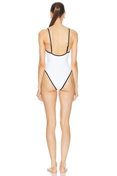 Find LPA Alessa One Piece In White on Editorialist. LPA Alessa One Piece in White Self: 80% polyamide 20% elastane Lining: 100% polyester. Made in Indonesia. Hand wash. Adjustable shoulder straps. LPAR-WX245. LPX270 U24. About the designer: Since its launch in 2016, the eponymous LPA label perfectly translates its elevated yet casual aesthetic into a cohesive vision. Epitomizing feminine Italian romance meets California tomboy, the ready-to-wear collection fashioned by Lara Pia Arrobio encapsulates the quintessential cool girl spirit with a raw, unapologetic attitude. Spring Elastane Swimwear, Sporty Second-skin Swimwear Made Of Elastane, Sporty Second-skin Elastane Swimwear, Second-skin Elastane Swimwear For Spring, Seamless Minimal Stretch Nylon Swimwear, Seamless Nylon Swimwear With Minimal Stretch, Chic Stretch Nylon Swimwear, Fitted Athleisure Swimwear For Spring, Sporty Stretch Swimwear In Polyamide