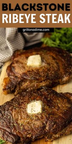 black stone ribeye steak on a cutting board with butter and parmesan cheese