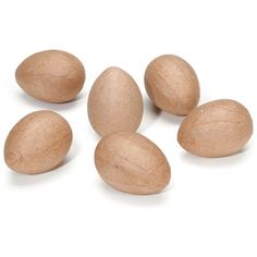 several almonds on a white background