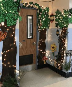 an indoor classroom decorated with trees and lights