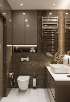 a modern bathroom with marble walls and flooring