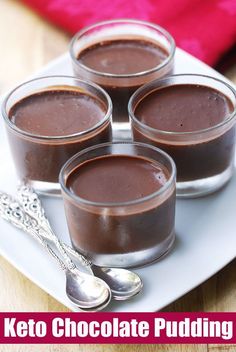 four glasses of chocolate pudding on a plate with spoons next to it and the words keto chocolate pudding