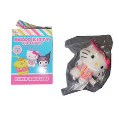 a hello kitty and friends plush doll in a package next to it's packaging