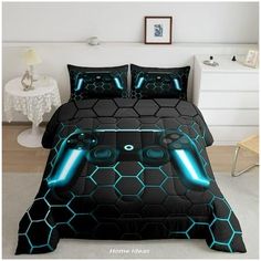 a bed with a black and blue comforter on it