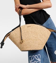 Paseo Small raffia basket bag in beige - Loewe | Mytheresa Ysl Tote Bag, Ysl Tote, Raffia Basket, Basket Tote, Loewe Bag, Raffia Bag, Basket Bag, Small Tote, Black Tote Bag