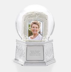 a crystal ball with an image of a woman in the center, and a heart on it