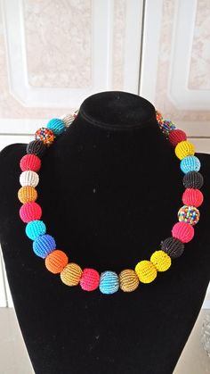 Colorful Beaded Necklace, African Beaded Jewelry, African Necklace, Handmade Necklace, Multi color Necklace, Gift For Her, NecklaceThis colorful beaded necklace is superbly crafted which can be worn with any outfit at different occasions and it will absolutely makes you stand out.Main color -multi color.The necklace can be available in plain colors.Wholesale available at a fair price,please contact me.For any clarification,please send me a convo or an e-mail.Thank you for visiting and happy shop Multicolor Round Beads For Gifts, Multicolor Beaded Round Beads Jewelry, Multicolor Beaded Necklaces With Round Beads, Multicolor Round Beads Necklace, Colorful Beaded Necklaces With Large Round Beads, Colorful Beaded Necklace With Large Round Beads, Colorful Necklace With Large Round Beads, Rainbow Necklace With Large Beads, Rainbow Necklaces With Large Round Beads