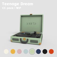 a suitcase with a record player in it and some color swatches to the side