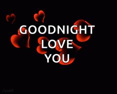 the words goodnight love you written in white on a black background with red heart shapes