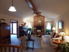 the living room is clean and ready for guests to use it as an entertainment area