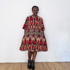 The pointer dress is fun! Our loose fit colourful dresses made out of non-stretchy African print are perfect for you in case you are looking for a style idea that is versatile, comfortable, and looks fabulous year-round. All materials used to design the dresses are sourced in Kenya.  MEASUREMENT GUIDE:  We recommend asking questions about sizes or you can take your own measurements (at the bust) if unsafe. Since its an A- Line, you only need to ensure that you have the right fit for the bust. Pl Casual Multicolor Midi Dress With Pockets, Patterned Printed Dresses With Relaxed Fit, Relaxed Fit Printed Patterned Dresses, Relaxed Fit Patterned Printed Dresses, Casual A-line Dress With Abstract Print, Casual Dresses With Bold Multicolor Print, Multicolor Midi-length Dress With Pockets, Multicolor Midi Length Dresses With Pockets, Multicolor Short Sleeve Dress With Pockets