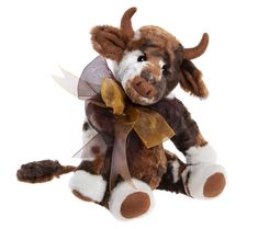 a brown and white stuffed animal with horns