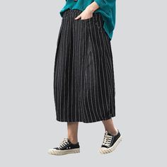 Make a statement in the 2023 Autumn Collection with this striped long women's denim skirt! Turn heads and channel the spirit of the millennium with this Y2K-inspired creation. boasting a high-waisted cut. sanded finish. and rubber closure. A unique blend of vintage and modern. this skirt promises to elevate your look with effortless sophistication.Why You'll Fall In LoveThis skirt is a timeless classic. offering a high-waisted silhouette with a unique. Y2K-inspired charm. Its vertical stripes. s Baggy Striped Bottoms For Spring, Spring Relaxed Fit Bottoms With Vertical Stripes, Trendy Cotton Midi Bottoms, Trendy Cotton Midi-length Bottoms, Trendy Midi Bottoms With Pockets, Trendy Midi Length Cotton Bottoms, Trendy Midi-length Cotton Bottoms, Cotton Midi Denim Skirt With Pockets, Casual Cotton Midi Bottoms