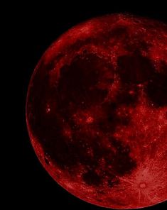 the full moon is shown in red and black