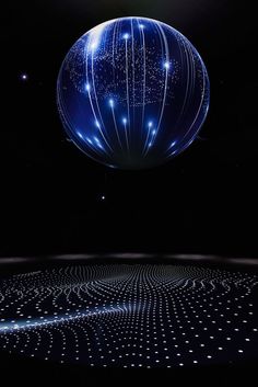 an image of a large ball in the air with stars on it's surface