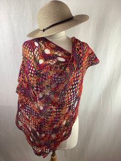 "This beautiful triangular shawl is made from 100% cotton thread. It is perfect for spring and summer. You can wear it even on the beach. Color: red, yellow, purple, green  Measurements are approximate : Length - 66\"/168cm                                                             Height - 30\"/76cm                                                             Care instructions: For the best results, hand wash recommended in cold water. Roll in to a towel and squeeze gently excess of water. Lay flat, reshape and dry. Didn't find what you were looking for? To see my other shawls click here: http://www.etsy.com/shop/Jutula?section_id=10168387 Thank you for visiting my shop." Crochet Poncho For Beach And Summer, Summer Beach Poncho With Crochet Details, Summer Beach Crochet Poncho, Crochet Shawl For Spring Festival, Crochet Shawl For Summer Beach, Spring Festival Crochet Shawl, Summer Beach Crochet Shawl, Spring Beach Shawl In Multicolor, Multicolor Beach Shawl For Spring