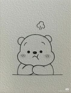 a drawing of a teddy bear sitting on top of a white wall with a thought bubble above it's head