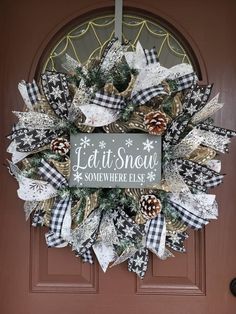 a christmas wreath that says let it snow somewhere else