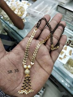 Black bead chain in leaf design. One gram gold balck bead chain. 20 September 2019 Bangel Design, Jewellery Gold, Gold Jewelry Indian, South Indian Bride