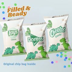 three bags of chips with dinosaurs on them