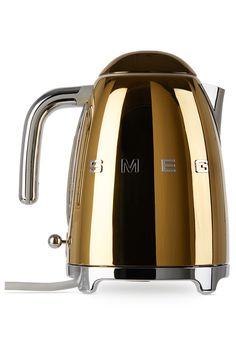 an electric kettle with the letter m on it